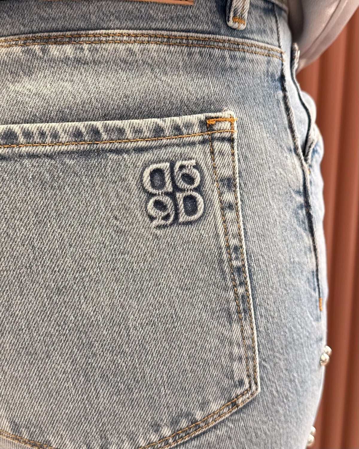 Glam studded bootcut jeans | Light washed blue